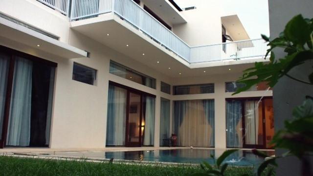Pasific Beach Cottages Mangsit Chambre photo