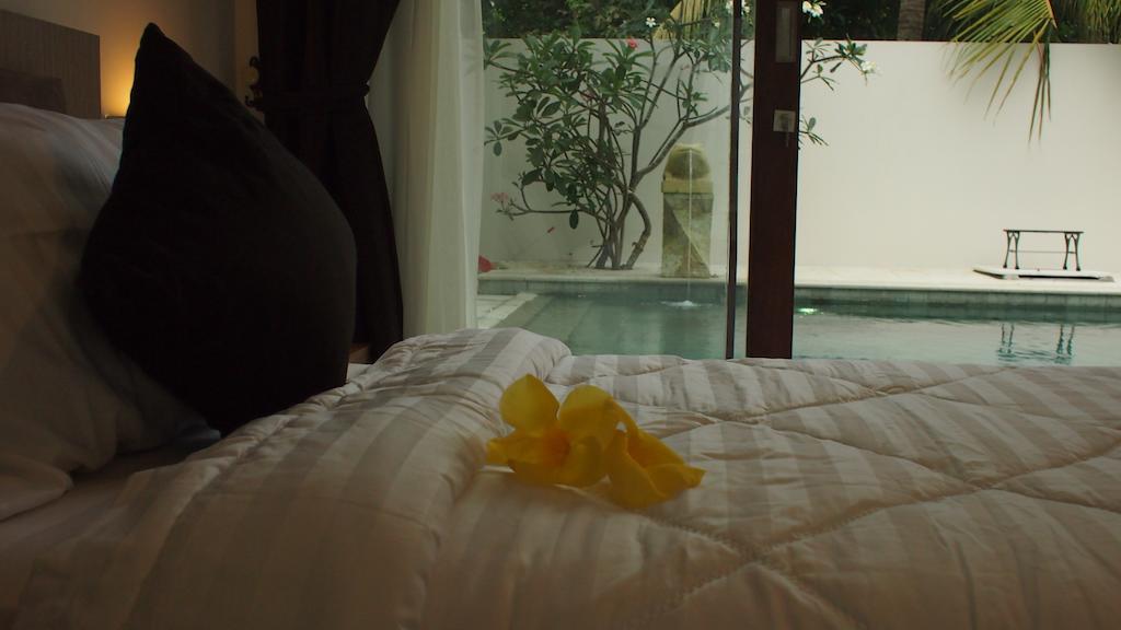 Pasific Beach Cottages Mangsit Chambre photo